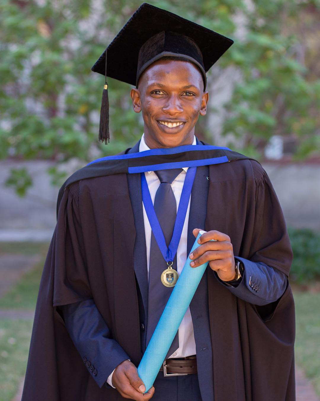 Tadiwa's graduation photo